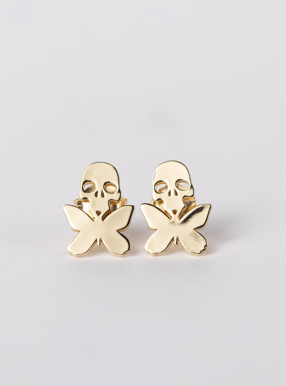 betty designs stud skull butterfly earrings